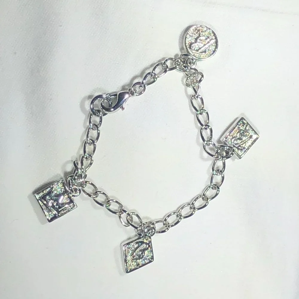 SILVER TONE BARBIE CHARM BRACELET